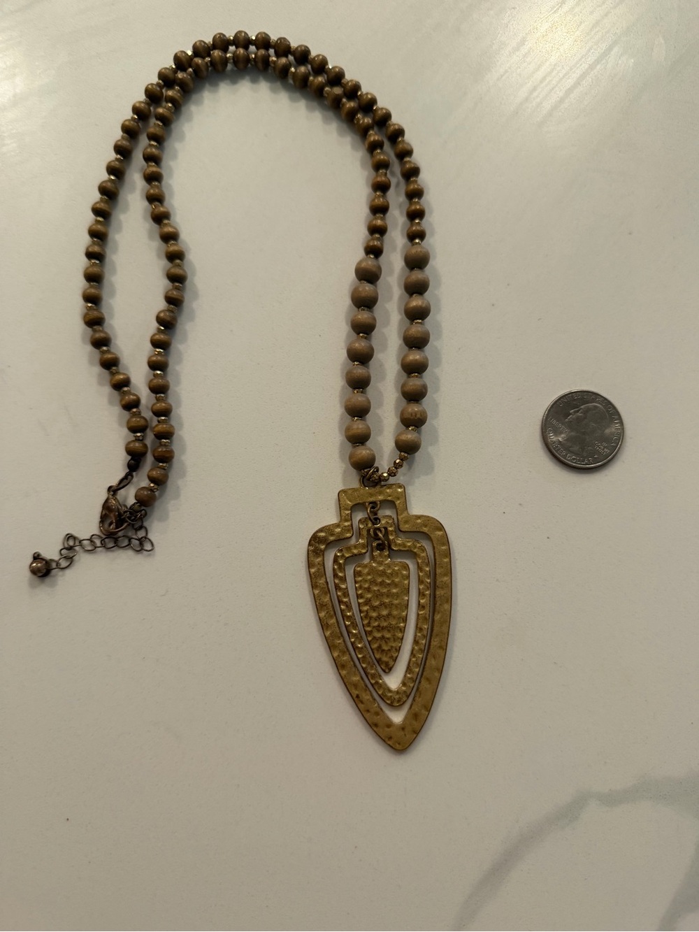 Gold-Tone Beaded Statement Necklace with Geometric Pendant